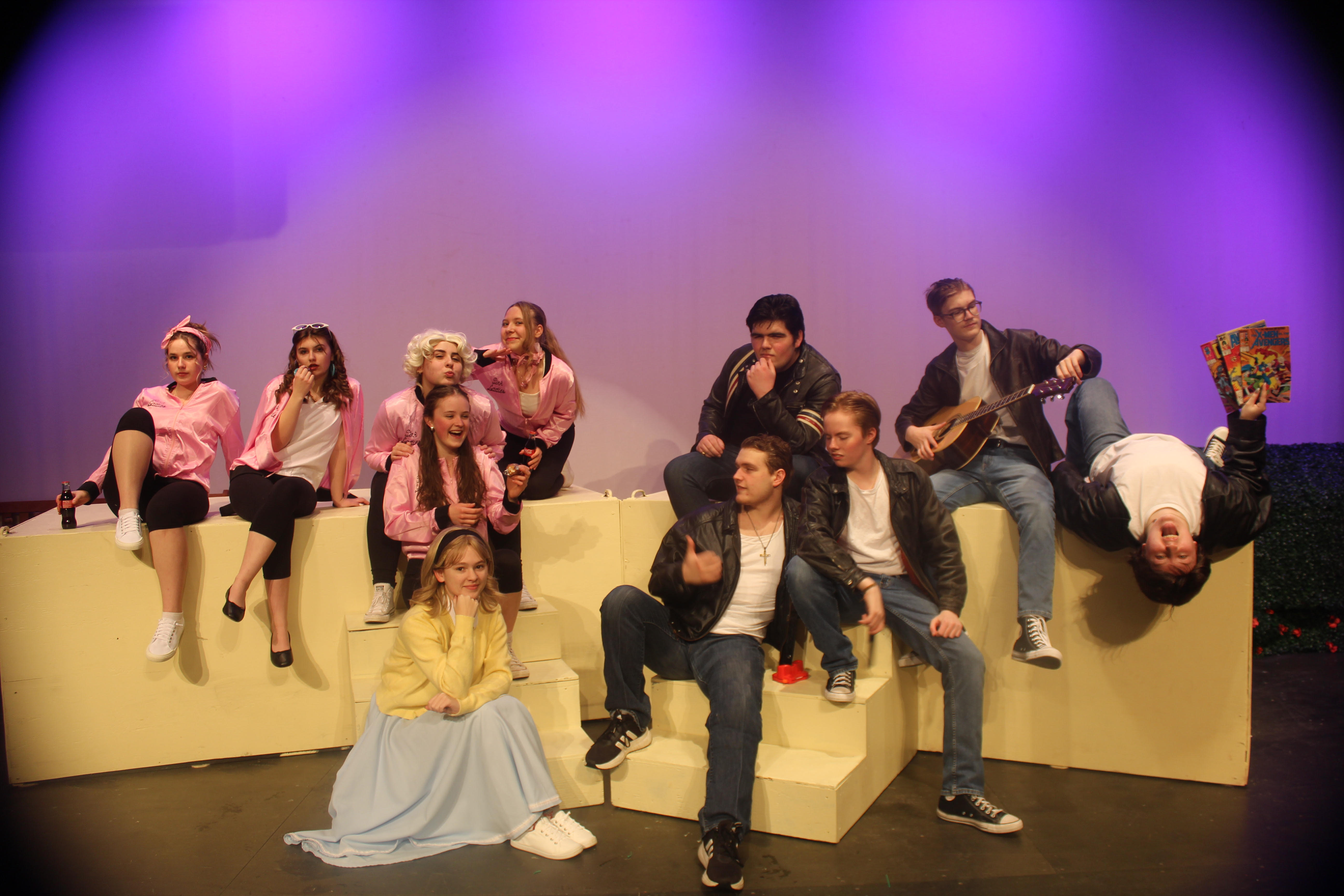 Left to right and front to back Grease cast members Caroline Dufort, Amelia Connor, Sara Giddens, Evie Hatfield, Mia Foley, Kate Bielikova, Bobby Quint, Graeme Mertens, Luke Chrimes, Owen Jeanette, and Alivia Collin